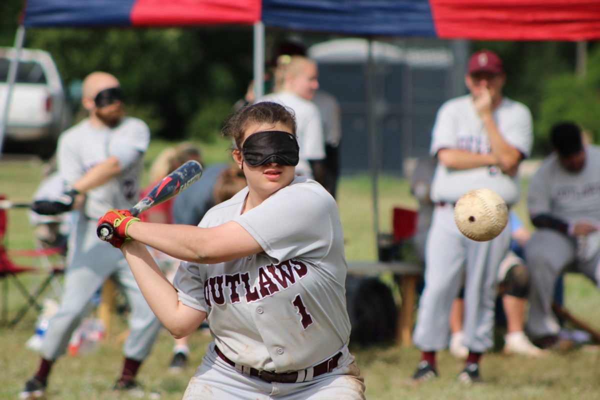 A batter takes a swing at a "beep" ball.

Photo from National Beep Baseball Association website