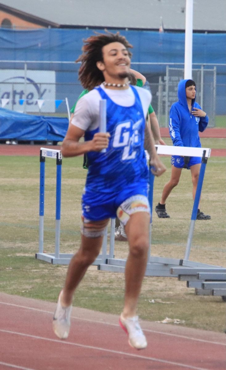 Senior Jay Daugherty brings it home for the 4x400 relay.